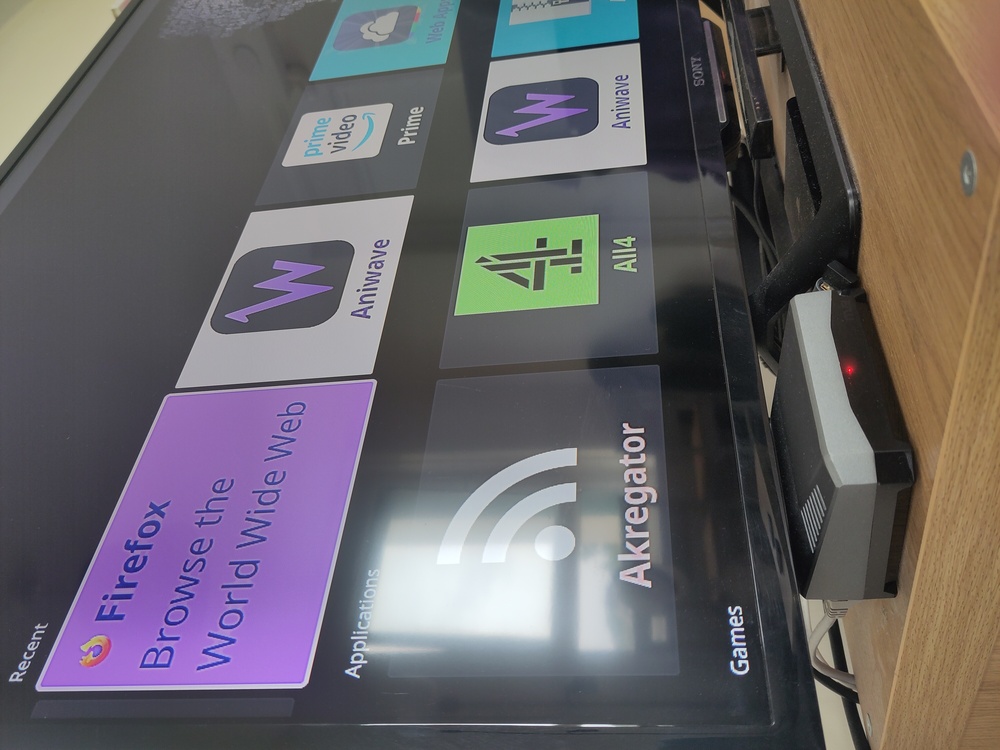 A Raspberry Pi 4 running KDE Plasma Bigscreen on a
HD TV, firefox browser, aniwave and amazon prime are listed
in the recent apps list
